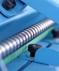 Close-up of the mechanism in Semi Automatic Label Applicator Machine For Round Plastic Glass Bottles And Jars Featuring Ultrasonic Sensor.