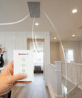 Heavy Duty Whole House Fan Delivers Fifty Six Hundred Sixty Five Cfm Of Fresh Breeze With A Wireless Remote in a modern home.