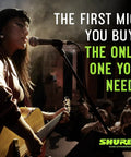 Woman singing into SM58 LC Dynamic Vocal Microphone For Live Gigs And Studio Sessions, with guitar at live event.