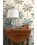 Kickass Midcentury Modern Vinyl Wallpaper With Sleek Leather Texture And Heavy Duty Commercial Grade Durability Custom Printed Just For You To Level Up Any Interior Space Today displayed in a room with wooden table and lamp.