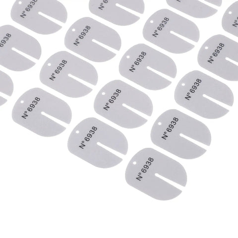Watch Dial Protector Pads Set, 100 Pieces, showing thin guards with printed serial numbers for precise maintenance
