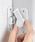 Heavy Duty White Sliding Barn Door Latch Featuring Precision 90 Degree Right Angle Lock And Quick Snap On Mount For Wood Doors in use.