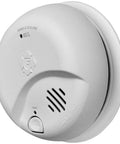 No Sweat Setup 12 Pack Hardwired Smoke And Carbon Monoxide Detector Combo featuring a round white unit with test button and alarm indicators.