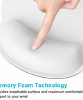 Ergonomic Mouse Pad With Memory Foam Wrist Rest For Pain Relief And Fatigue Reduction Ultra Smooth Surface And Non Slip Base Go To Choice For Gaming Office And Laptop Use White, with finger pressing padded wrist area.