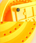 Close-up of yellow Rotary Bur Holder Tool With 116 Holes, featuring drill bit slots on 360 Degree Rotating Base.