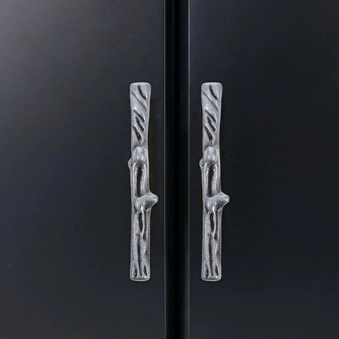 Rustic Branch Cabinet Handle Set Zinc Alloy Twig Pulls for drawers and closet doors on a black cabinet, decorative hardware