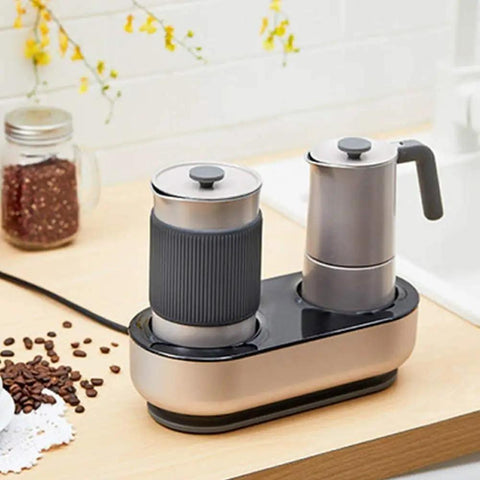 Mini Espresso Maker With Dual Pressure Extraction And Silky Milk Frother Styled Like A Classic Moka Pot on kitchen counter.