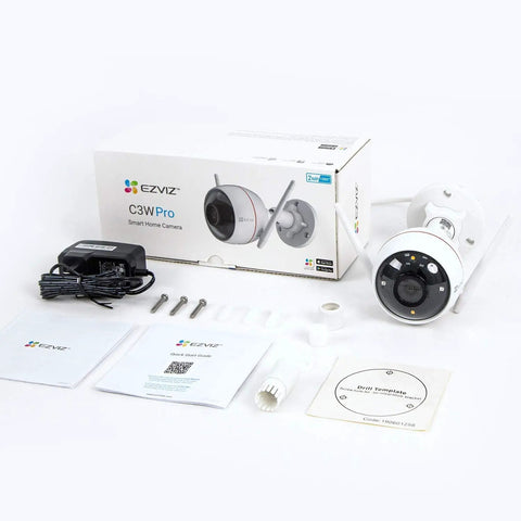 2K Outdoor Security Camera For Home, WiFi Surveillance unboxed with components and instruction manual