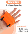 Hand holding Easy Orange Mower Blade Sharpener Kit For Reel Mowers With Dual Sharpening Slots Bed Knife And Reel Blade Sharpener