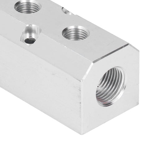 Corner view of Heavy Duty High Flow Aluminum Pneumatic Block with 40x40mm footprint, G1/2 inlet, and G1/4 outlet
