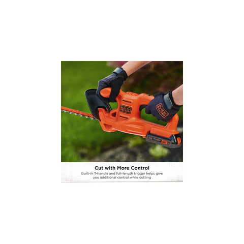 Person using 20V Max Cordless Hedge Trimmer With 18 Inch Dual Action Blade Delivers Up To 2400 Cuts Per Minute Handles Branches Up To Five Eighths Inch Includes Battery And Charger Lightweight With Reduced Vibration LHT218C1