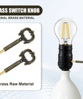 2 Pack Solid Brass Lamp Switch Knobs Retro Key Style Turn Handles Universal Fit with bulb in lamp, showcasing brass detail.