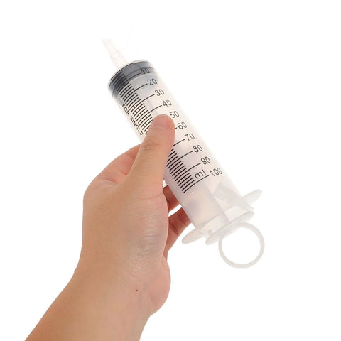 Heavy Duty Manual Fluid Extraction Pump For Automotive Engine Oil Transfer Tool held in hand for fluid transfer use.