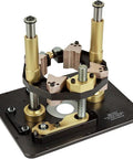 Professional Router Table Lift Featuring Spot On Crank Height Adjustment And Tight Reducing Rings For No Sweat Bit Changes On Your Home Shop Workbench With Precision Calibration.