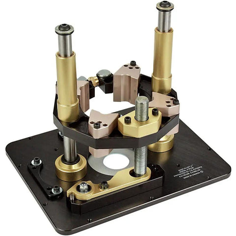 Professional Router Table Lift Featuring Spot On Crank Height Adjustment And Tight Reducing Rings For No Sweat Bit Changes On Your Home Shop Workbench With Precision Calibration.