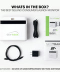 Box contents of Launch Monitor And Golf Simulator With Doppler Radar And Enhanced Camera 100K Courses Real Time Simulation Wi Fi And USB C For Home Practice Game Improvement And Weekend Golf Sessions For Real Golfers, including monitor, cables, and guides.