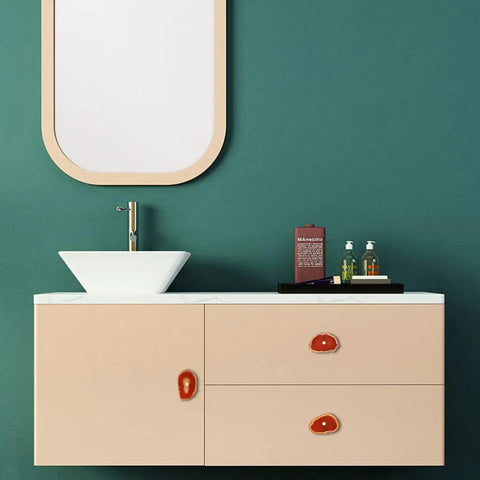 Dope Set Of 4 Agate Slice Drawer Knobs With Screws, geode crystal cabinet pulls on beige bathroom cabinet against green wall.