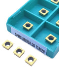 SPMG060204 inserts in a storage tray for Premium 10Pc Indexable Carbide Lathe Tool Set For CNC Turning Steel And Stainless Steel.