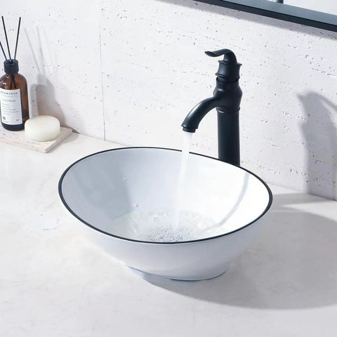 16 Inch Oval Bathroom Vessel Sink And Brushed Nickel Faucet Combo In White Ceramic Porcelain Above Counter Design With Pop Up Drain Vanity Sink Set For A Sleek Modern Bathroom Upgrade And Easy Install, water flowing into sink