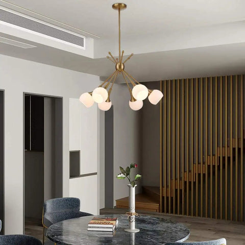 Six Light Sputnik Pendant Light Modern Mid Century Chandelier in dining room with rotatable arms, gold finish.