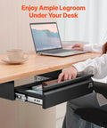 Total Game Changer Hella Smooth Slide Out Under Desk Drawer For Sit Stand Workstation Attachable Steel Storage Bin For Hidden Office Supplies Organizer Black with open drawer and laptop.