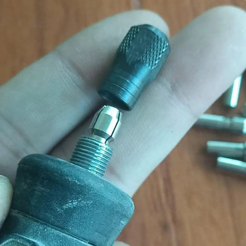 Pro Grade Ten Piece 1/8 Inch Collet Nut Set With 1/8 Inch Collet Clamping Nut And Three Jaw Keyless Chuck for rotary tools, close-up view