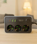 6.5 Foot Extension Cord With Three AC Outlets Two USB Type C Ports One USB Port on a desk with a soft background.