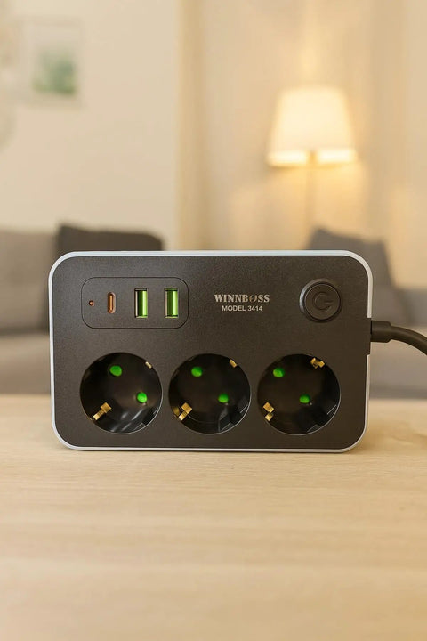 6.5 Foot Extension Cord With Three AC Outlets Two USB Type C Ports One USB Port on a desk with a soft background.