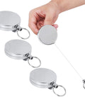 Retractable Key Ring Wire Keychain With Belt Clip Anti Theft Anti Lost Design 5 Cm Diameter Metal Electroplated Gear shown in use