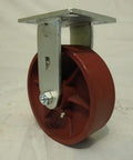 6 Inch Ductile Steel Caster Wheel Set With Heavy Duty Roller Bearings And Zerk Fitting featuring a red wheel and metal bracket for warehouse use.