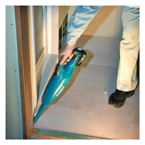 Person using Cordless 18V Li Ion Vacuum Cleaner Body Only for Vehicles and Jobsites, Lightweight with Strong Suction and Large Dust Capacity