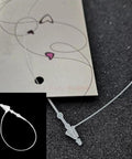 5 Inch Clear Plastic Hang Tag Fastener Snap Locks Slick Retail Fix with tag, showing clear locking mechanism and loop.