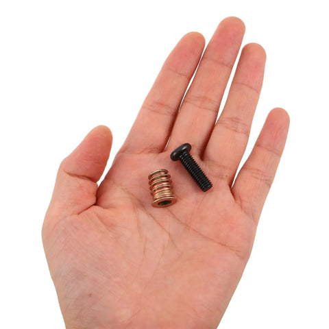 Hand holding Wood Furniture Screws And Threaded Inserts Kit For Solid Hidden Installations In Home Furniture Assembly With Long Screws