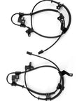 ABS wheel speed sensor pair with harnesses for Kia Soul (2010–2013); front left and front right, black plastic with brackets