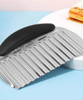 Front view of heavy-duty stainless steel crinkle cutter with black ergonomic handle for slicing potatoes and vegetables.