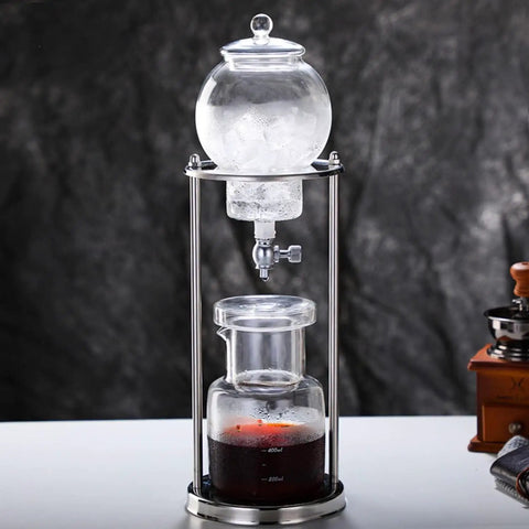Premium Cold Brew Drip Tower With Adjustable Flow Control Borosilicate Glass Carafe And Heavy Duty Stainless Steel 600Ml showing iced coffee brewing.