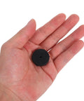 Hand holding small component from Universal Binding Pad And Gasket Set For Office Machines 15 Piece Binder Kit For High Frequency Hole Punching