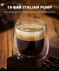 Top Shelf All In One Automatic Espresso Coffee Maker And Cappuccino Latte Brewer With Quick Milk Froth And Easy Turn Knobs For No Hassle Daily Grinds At Home in a glass cup with rich espresso and frothy crema.