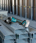 18V LXT Brushless Cordless Paddle Switch Cutoff And Angle Grinder Four And One Half Inch To Five Inch on steel beams