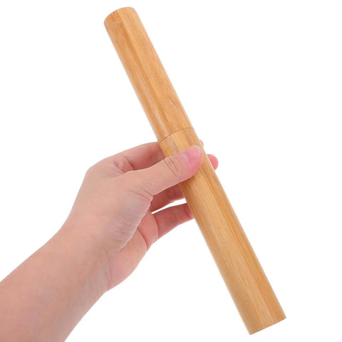 Hand holding a wooden poster tube with cap for artwork and certificates, built to last heavy duty document storage tube, close-up view.