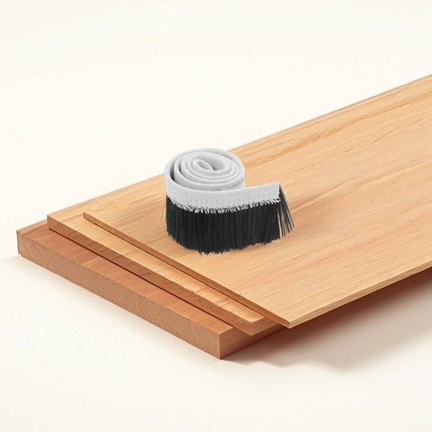 Heavy Duty Cnc Router Shoe Brush Strip And Engraving Spindle Motor Dust Guard With Quick Snap Fit on wooden planks.