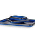 Magnetic Parts Tray Set With Three Collapsible Sizes For Mechanics, shown stacked; blue silicone, non-marring rubber edge.