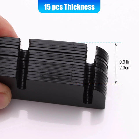 Hand holding 15-pack of Door Hinge Shims For Interior Door Alignment, 0.060 Inch Thick PVC, showing thickness dimensions 0.91in or 2.3cm