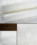 Vintage Cream White Victorian Damask Wallpaper Roll Featuring Rich Embossed Non Woven Texture For Bedroom Living Room Decor That Will Instantly Level Up Your Home Vibe close-up of embossed design and texture.