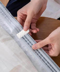 Person sealing vacuum bag with 30 Pack Vacuum Storage Bag Sealing Clips Quick Snap Zipper Grips Reusable Bag Sealer