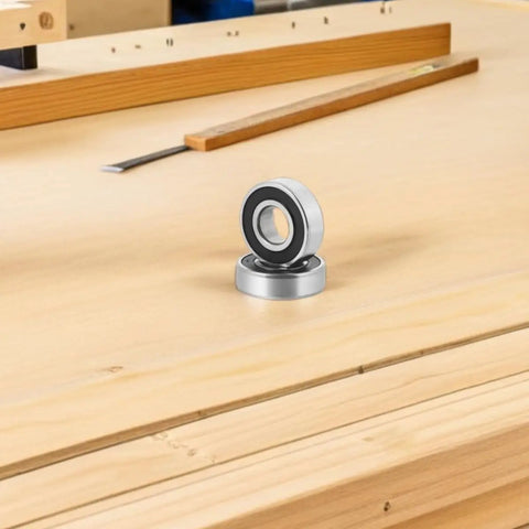 High Speed Deep Groove Ball Bearings Kit For Electric Vehicles Four Pack Rear Axle Bearings on wood surface, sealed steel ball bearings