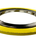 Spiral wound gasket with yellow outer ring; 40-inch ID, 304 stainless steel core with flexible graphite facing.