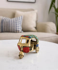 Dope Vintage Brass Auto Rickshaw Miniature Showpiece For Living Room Decor Tabletop Accent, 4.5x2.4x3 inches, solid brass with colorful stones.