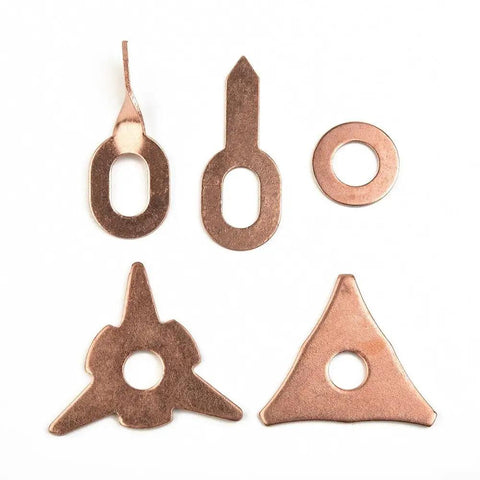 Copper Plated Welding Washer Pads Set For Auto Sheet Metal, 50 Mixed Pads In Triangular And Star Shapes on white background