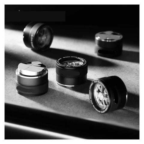 58mm WDT Needle Tool Coffee Distributor Complete Toolkit With Adjustable Dosing Ring and Premium Barista Leveler, black items arranged on a surface.